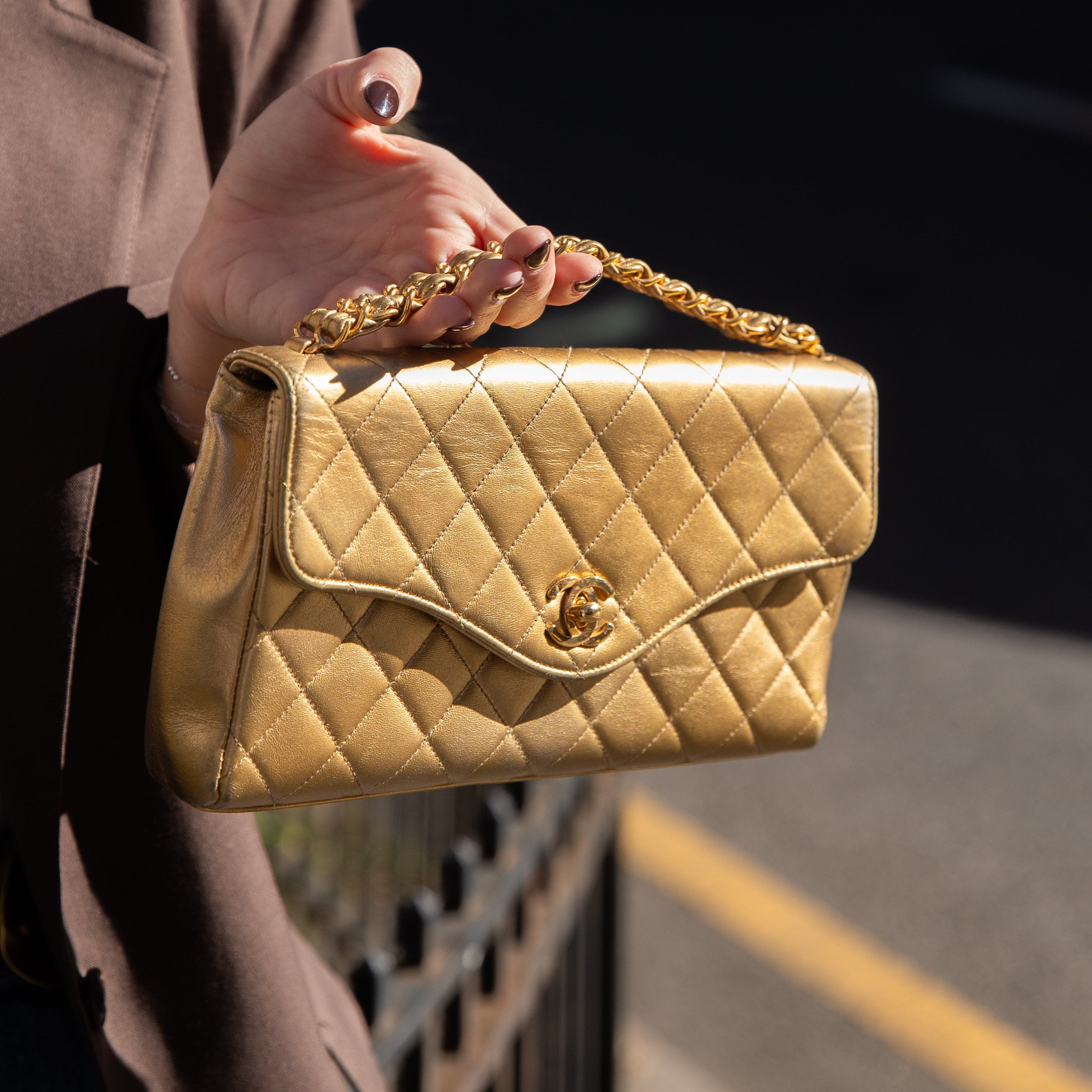 Vintage Chanel Gold Matelasse mettalic hand  clutch