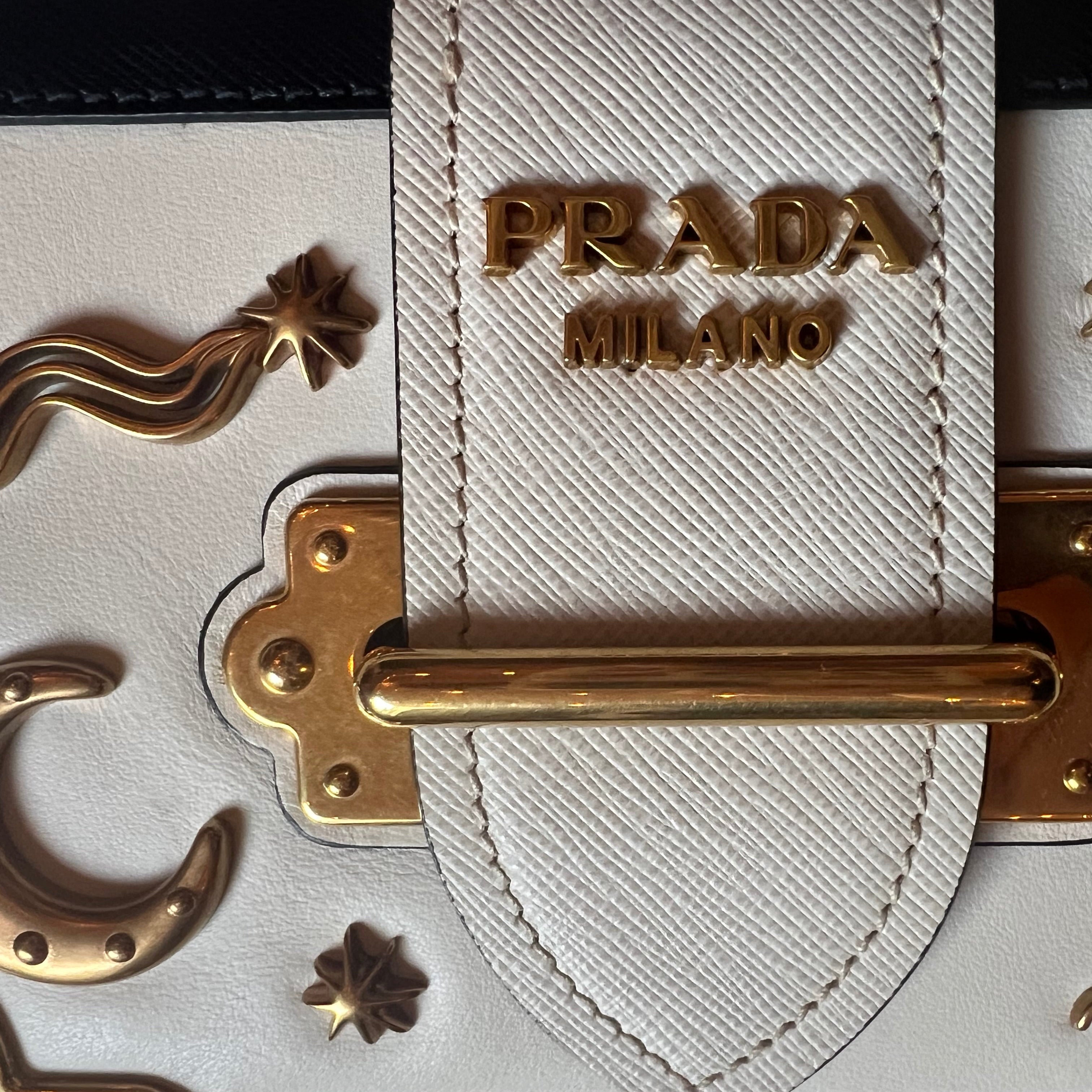 Prada authentic moon & starts white leather bag